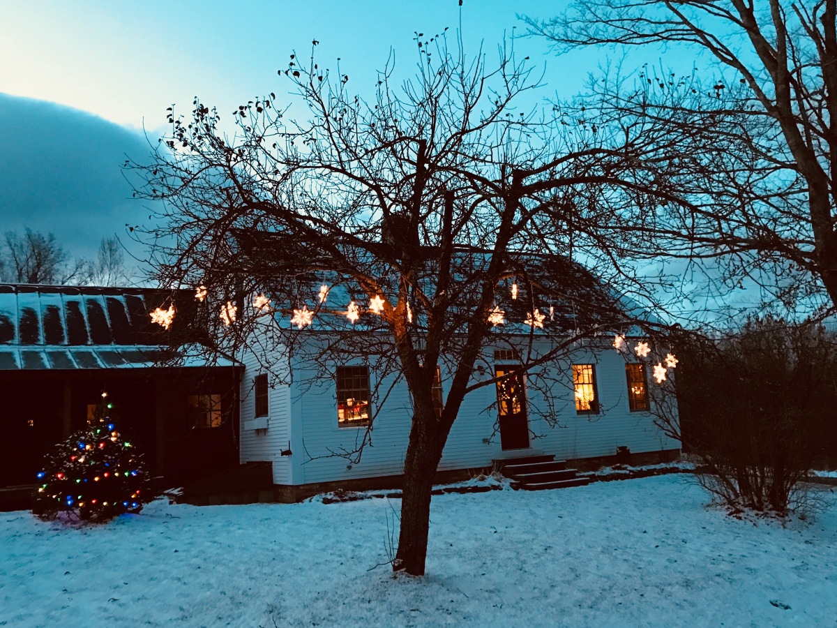 Vermont farmhouse with snowflake lights